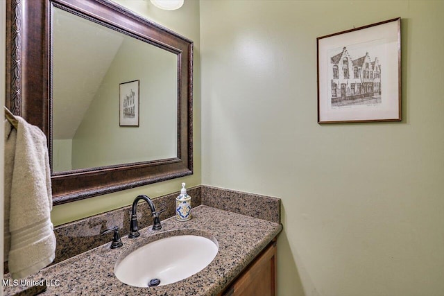 911 Tetbury Pl, Brandon, MS 39047 - bathroom featuring vanity and lofted ceiling