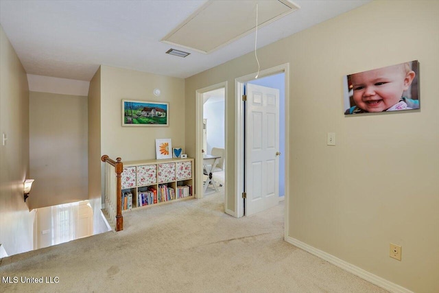911 Tetbury Pl, Brandon, MS 39047 - corridor featuring attic access, carpet, an upstairs landing, and baseboards