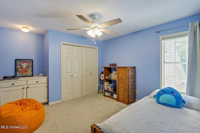 911 Tetbury Pl, Brandon, MS 39047 - bedroom with light carpet, a closet, and a ceiling fan