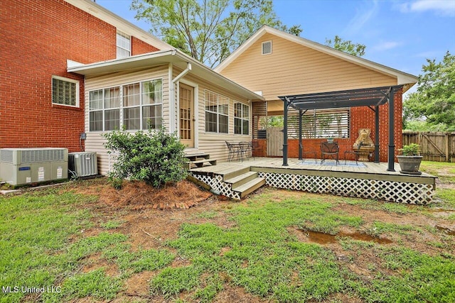 911 Tetbury Pl, Brandon, MS 39047 - rear view of house featuring central AC unit and a deck