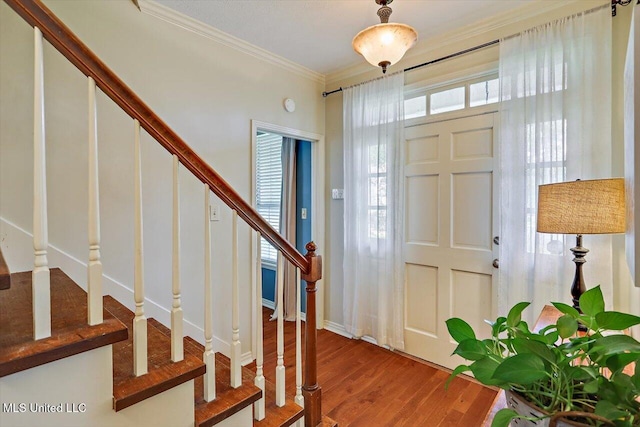 911 Tetbury Pl, Brandon, MS 39047 - entrance foyer with stairs, ornamental molding, and wood finished floors