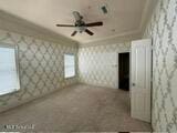 spare room with ornamental molding