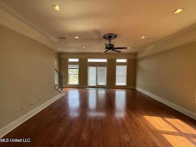 spare room featuring ornamental molding, hardwood / wood-style flooring, and ceiling fan