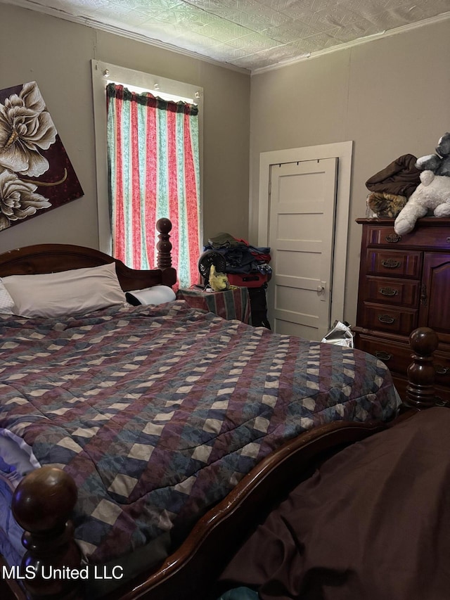 15 E Franklin St, Natchez, MS 39120 - bedroom featuring crown molding
