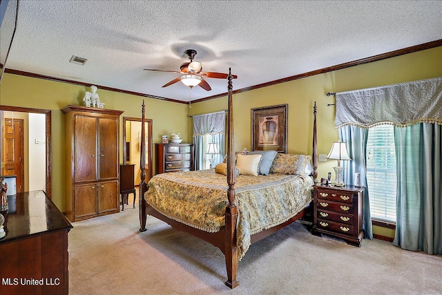 carpeted bedroom with a textured ceiling, multiple windows, and ceiling fan