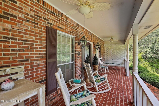 view of patio featuring a porch and ceiling fan