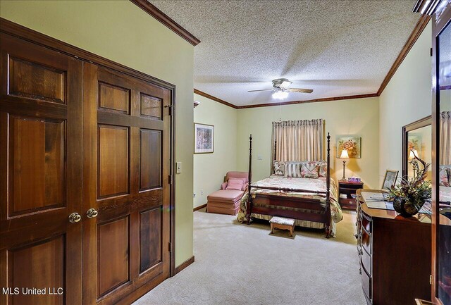 1600 Pine Hill Dr, Raymond, MS 39154 - bedroom with crown molding, carpet flooring, a textured ceiling, and a ceiling fan