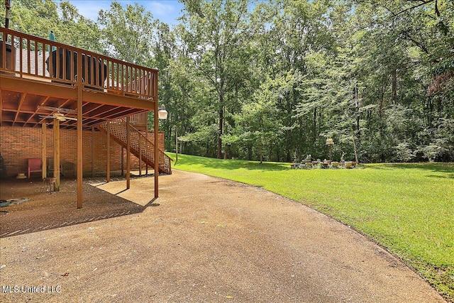 view of yard with a deck