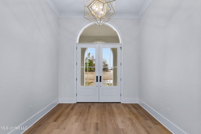 54 Windermere Blvd, Madison, MS 39110 - entrance foyer featuring french doors, a chandelier, ornamental molding, wood finished floors, and baseboards