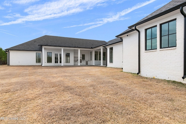 54 Windermere Blvd, Madison, MS 39110 - back of house with brick siding and roof with shingles