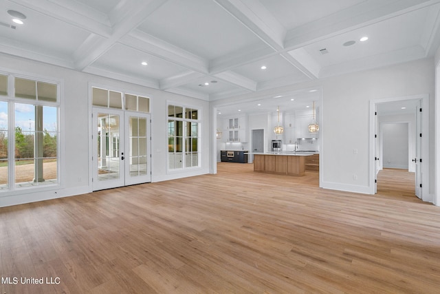 54 Windermere Blvd, Madison, MS 39110 - unfurnished living room featuring light wood-style flooring, french doors, coffered ceiling, beamed ceiling, and recessed lighting
