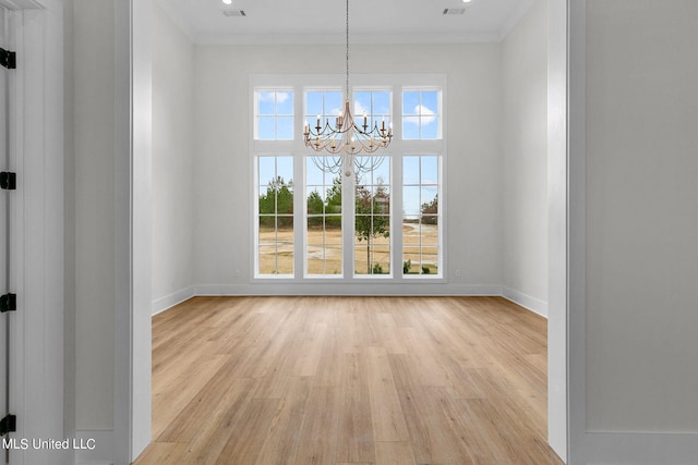 54 Windermere Blvd, Madison, MS 39110 - unfurnished dining area with light wood finished floors, a chandelier, ornamental molding, and baseboards