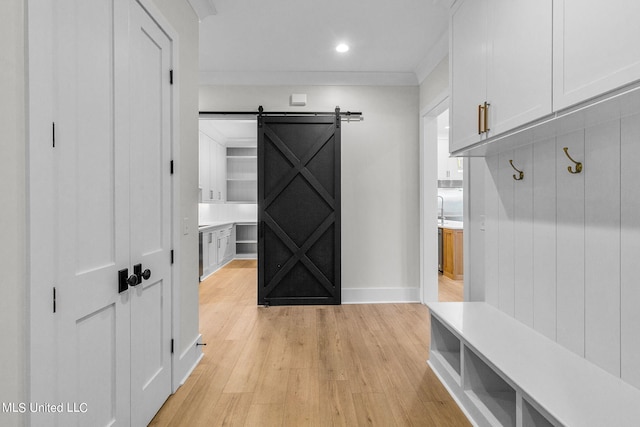 54 Windermere Blvd, Madison, MS 39110 - mudroom featuring light wood-style floors, a barn door, recessed lighting, and baseboards