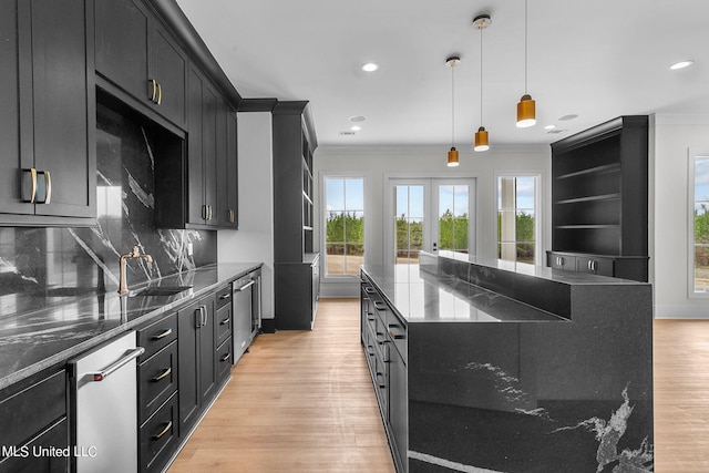 54 Windermere Blvd, Madison, MS 39110 - kitchen with crown molding, dark cabinetry, healthy amount of natural light, backsplash, and recessed lighting