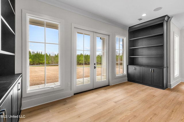 54 Windermere Blvd, Madison, MS 39110 - entryway featuring light wood-style floors, french doors, ornamental molding, built in features, and baseboards