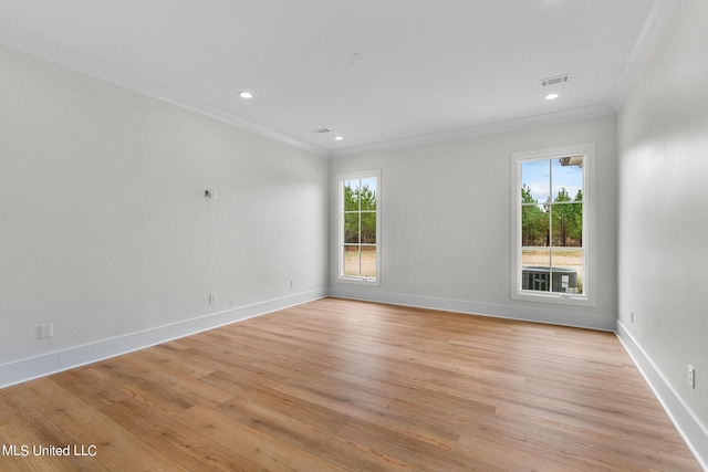 54 Windermere Blvd, Madison, MS 39110 - empty room featuring healthy amount of natural light, light wood finished floors, crown molding, baseboards, and recessed lighting