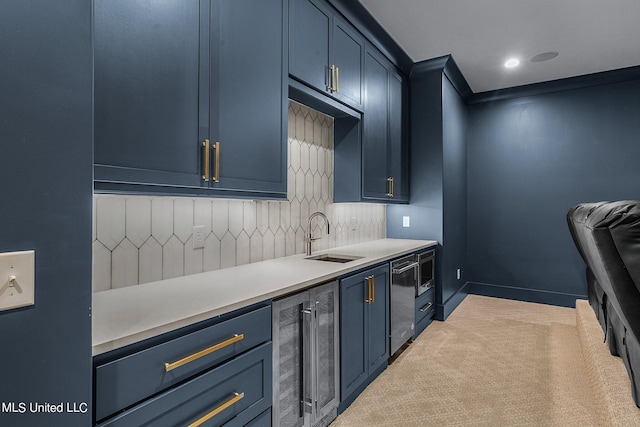 54 Windermere Blvd, Madison, MS 39110 - kitchen featuring wine cooler, a sink, blue cabinets, light colored carpet, and light countertops
