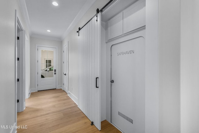 54 Windermere Blvd, Madison, MS 39110 - corridor with a barn door, light wood finished floors, crown molding, recessed lighting, and baseboards