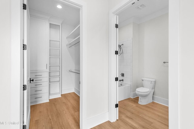 54 Windermere Blvd, Madison, MS 39110 - full bath featuring wood finished floors, toilet, recessed lighting, baseboards, and a spacious closet
