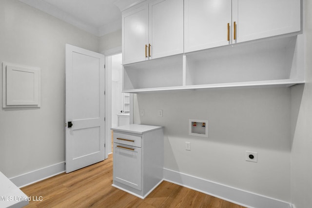 54 Windermere Blvd, Madison, MS 39110 - clothes washing area featuring electric dryer hookup, hookup for a washing machine, cabinet space, baseboards, and light wood-style flooring