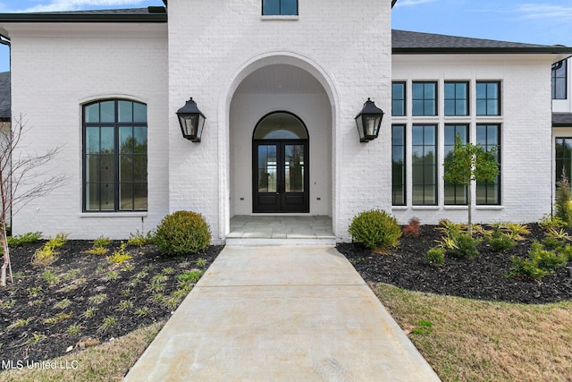 54 Windermere Blvd, Madison, MS 39110 - view of exterior entry with french doors and brick siding