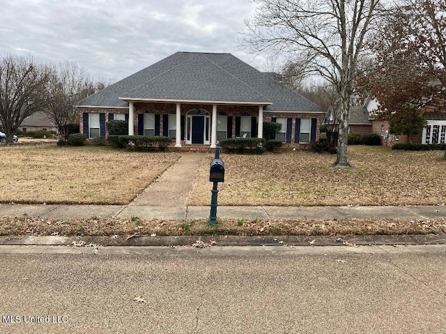 view of front facade featuring covered porch