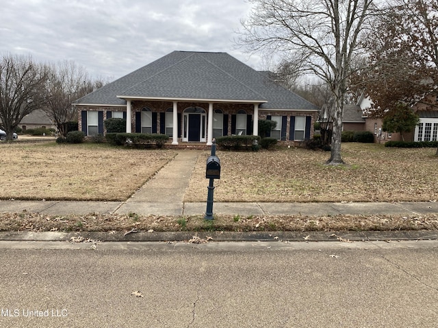 view of front of house with covered porch