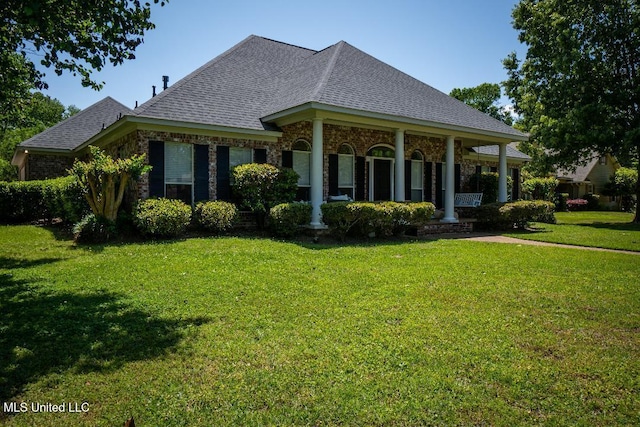 view of front of home with a front lawn