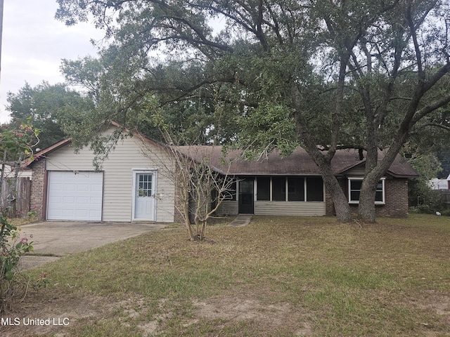 single story home with a front lawn and a garage