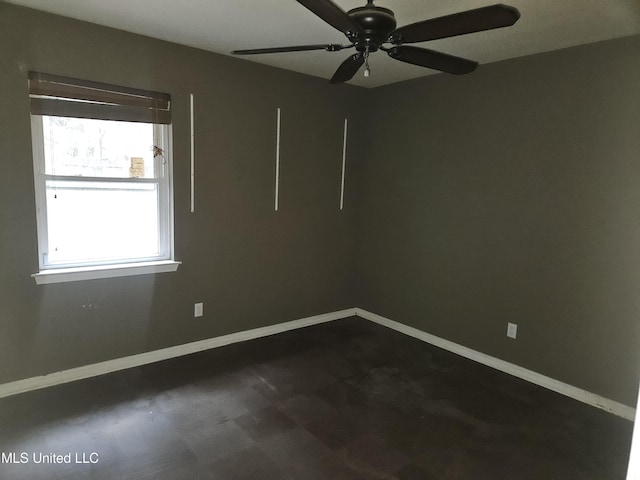 spare room featuring ceiling fan