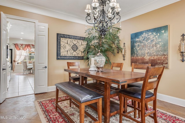 2550 Jones Rd, Terry, MS 39170 - dining area featuring a chandelier, light tile patterned flooring, and ornamental molding