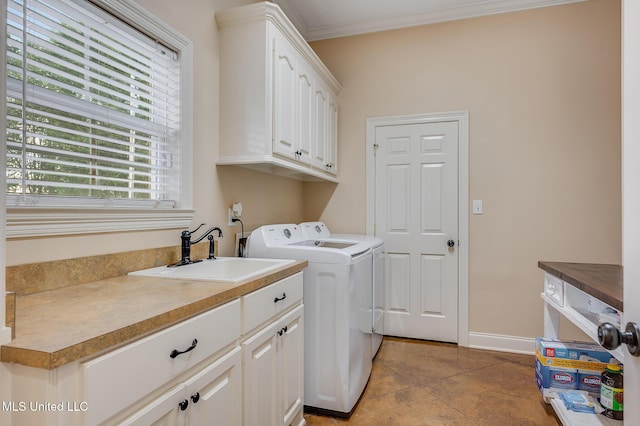 2550 Jones Rd, Terry, MS 39170 - washroom featuring washing machine and dryer, cabinet space, tile patterned floors, and ornamental molding