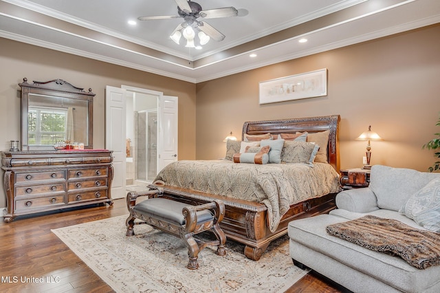 2550 Jones Rd, Terry, MS 39170 - bedroom with crown molding, wood finished floors, recessed lighting, a tray ceiling, and ensuite bath
