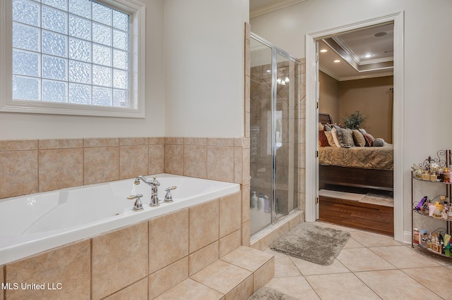 2550 Jones Rd, Terry, MS 39170 - full bath with ornamental molding, ensuite bathroom, a shower stall, a bath, and tile patterned flooring