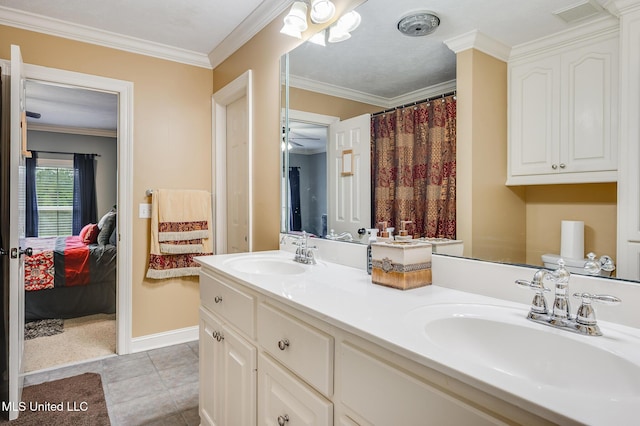 2550 Jones Rd, Terry, MS 39170 - full bath with connected bathroom, double vanity, crown molding, and tile patterned floors