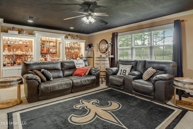 2550 Jones Rd, Terry, MS 39170 - carpeted living area featuring ornamental molding, a dry bar, and ceiling fan