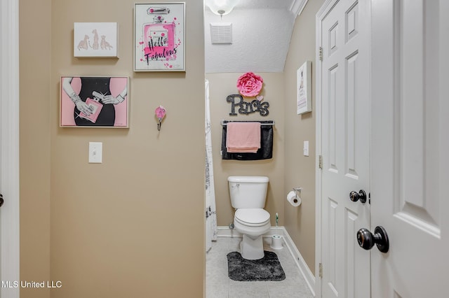 2550 Jones Rd, Terry, MS 39170 - bathroom with toilet and tile patterned flooring