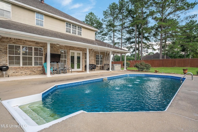 2550 Jones Rd, Terry, MS 39170 - view of swimming pool featuring a patio area and french doors
