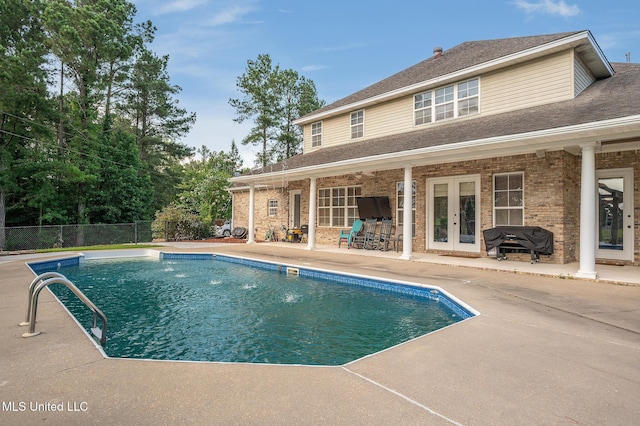 2550 Jones Rd, Terry, MS 39170 - view of swimming pool featuring a patio and french doors