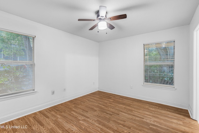 unfurnished room with light hardwood / wood-style floors and ceiling fan