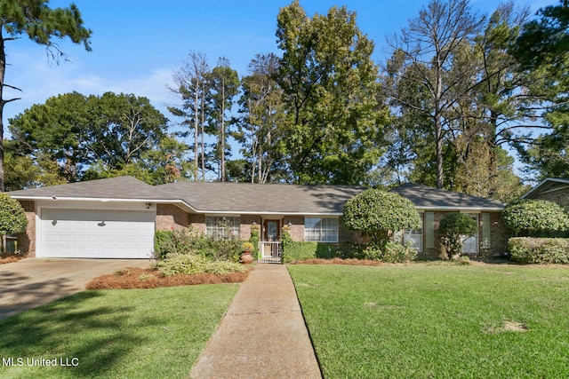 ranch-style house featuring a front yard and a garage