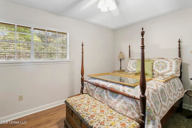 bedroom featuring ceiling fan and hardwood / wood-style floors