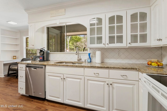 kitchen featuring white cabinetry, decorative backsplash, dishwasher, and dark hardwood / wood-style flooring