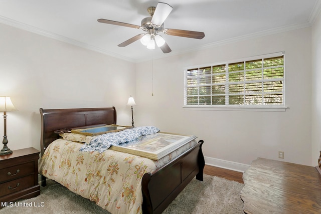 bedroom with ceiling fan, hardwood / wood-style flooring, and ornamental molding