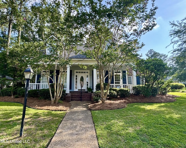 279 Bayview Dr, Madison, MS 39110 - view of front of home with a porch, a front yard, and roof with shingles