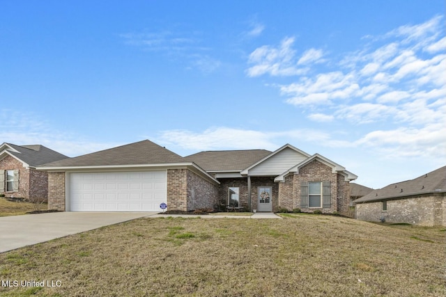 single story home featuring a front yard, brick siding, a garage, and driveway