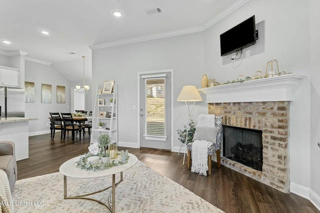 living area featuring baseboards, a fireplace, ornamental molding, and dark wood-style flooring