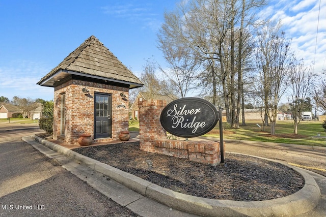 view of community sign