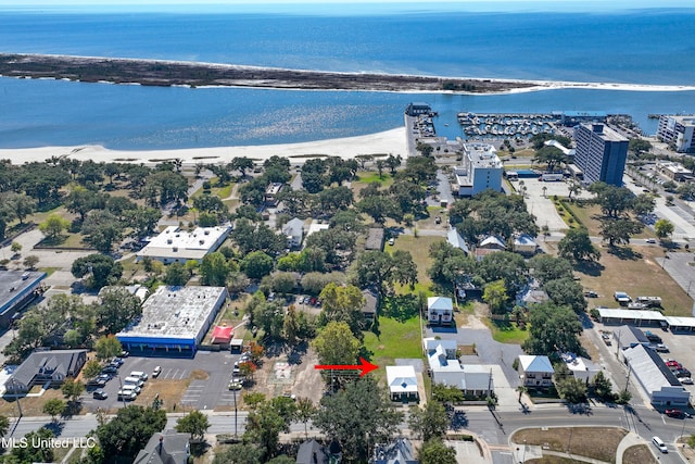 aerial view featuring a water view and a view of the beach