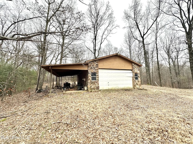 garage with a carport